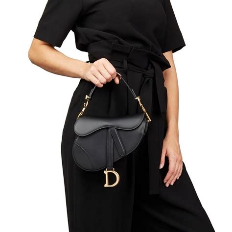 dior saddle bag black leather|Dior saddle bag on model.